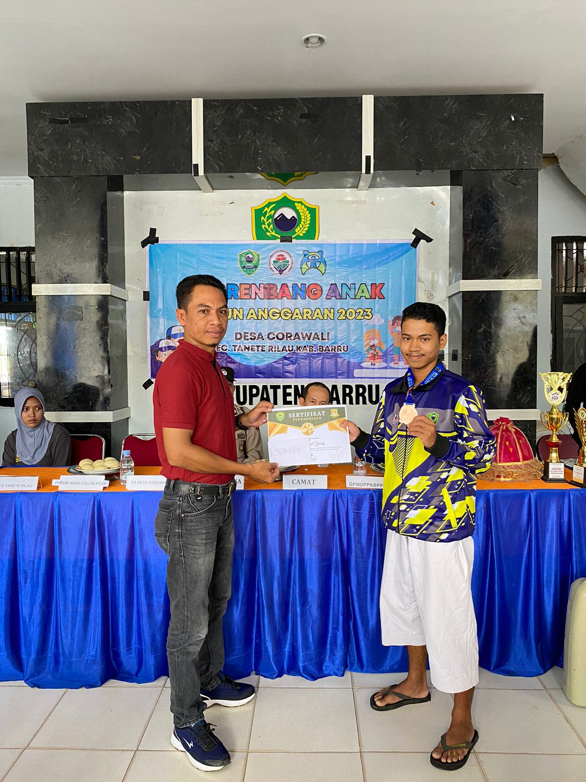 Pemdes Corawali Gelar Musrembang Anak dan Penyerahan Penghargaan Bagi Warga Berprestasi