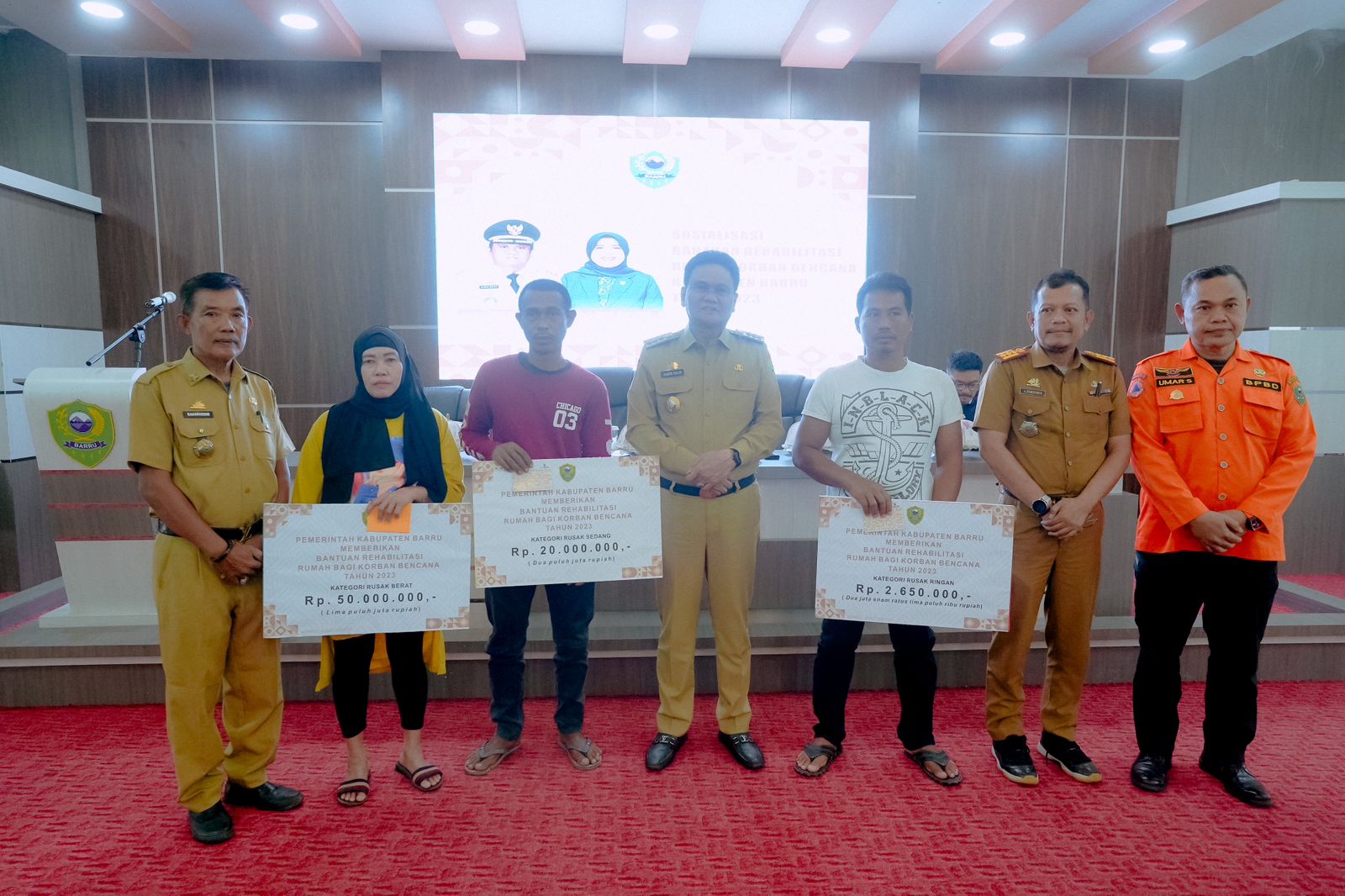 Suardi Saleh Buka Sosialisasi Rehabilitasi Rumah Terdampak Bencana dan Serahkan Bantuan